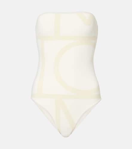 Monogram strapless jersey swimsuit - Toteme - Modalova