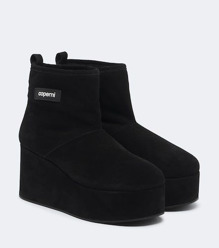 Stivaletti con zeppa in suede e shearling - Coperni - Modalova