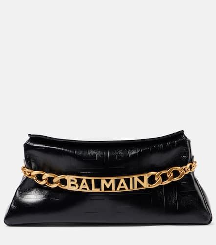 PB embossed leather clutch - Balmain - Modalova