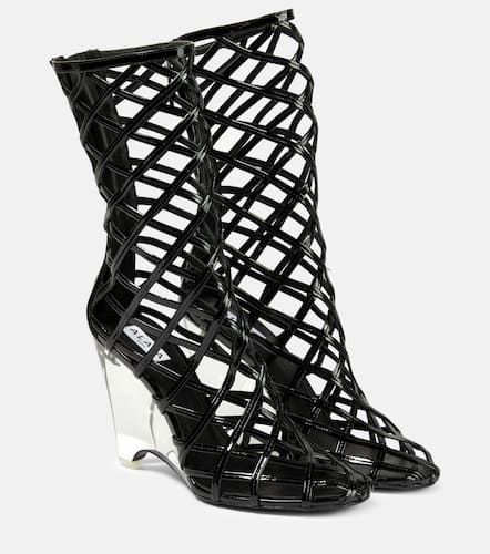 AlaÃ¯a Leather wedge ankle boots - Alaia - Modalova
