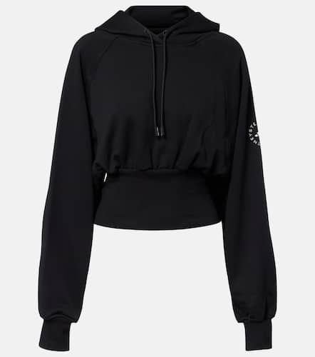 Felpa cropped in jersey di cotone con cappuccio - Adidas by Stella McCartney - Modalova