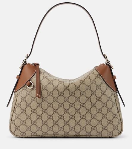 GG Canvas Medium leather-trimmed shoulder bag - Gucci - Modalova