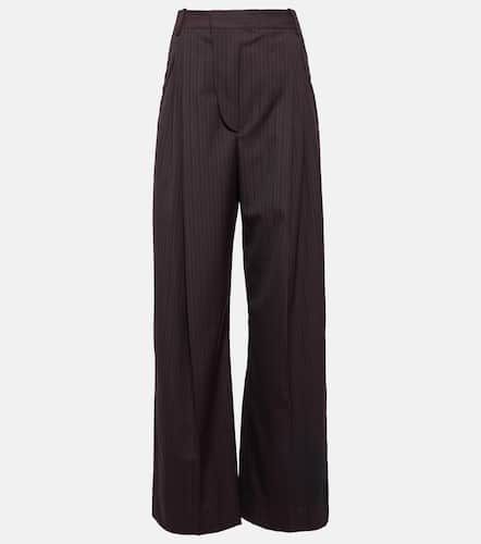Pinstripe wool-blend barrel-leg pants - Victoria Beckham - Modalova