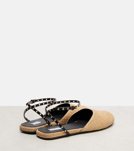 Alaia Leather-trimmed raffia flats - Alaia - Modalova