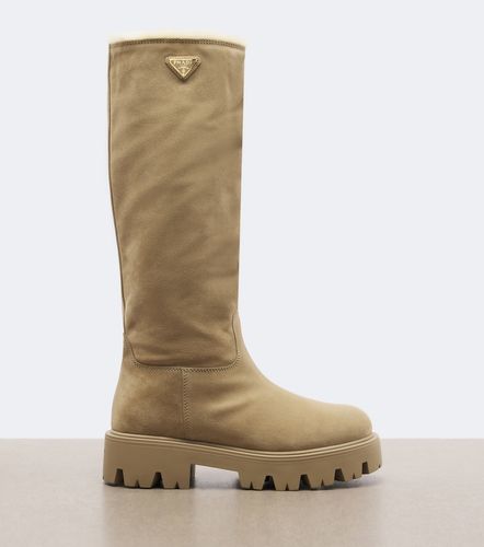 Shearling-lined suede knee-high boots - Prada - Modalova