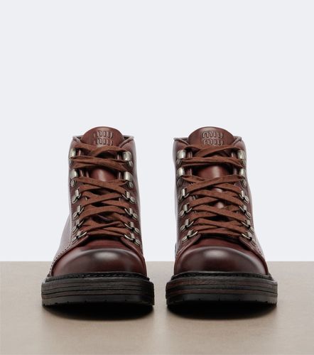 Miu Miu Leather lace-up boots - Miu Miu - Modalova