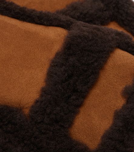 Muffole in pelle con shearling - Yves Salomon - Modalova