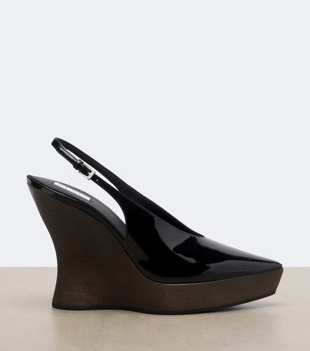 Patent leather wedge slingback clogs - Alaia - Modalova