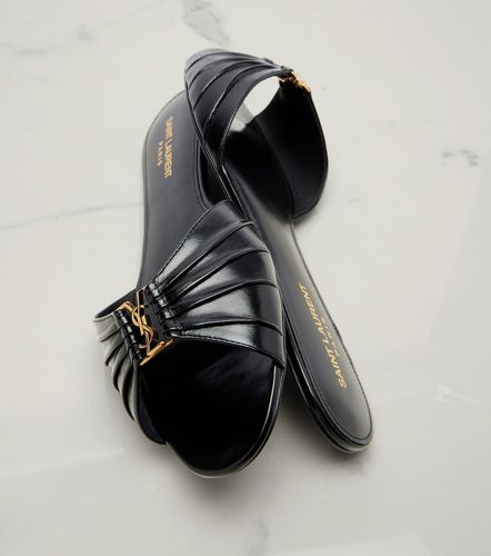 Cassandre leather slides - Saint Laurent - Modalova