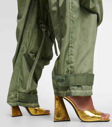 Devon laminated leather mules - The Attico - Modalova