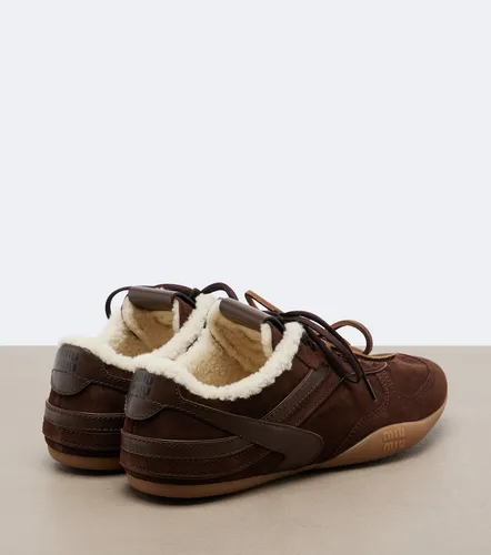 Gymnasium leather-trimmed suede sneakers - Miu Miu - Modalova