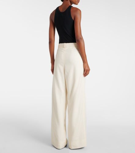 Low-rise wide-leg wool pants - Wardrobe.NYC - Modalova