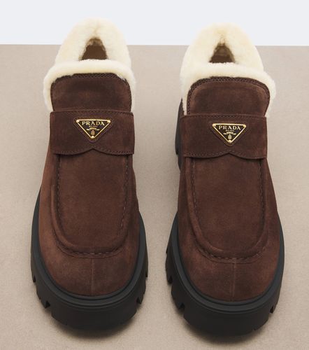 Shearling-lined suede ankle boots - Prada - Modalova