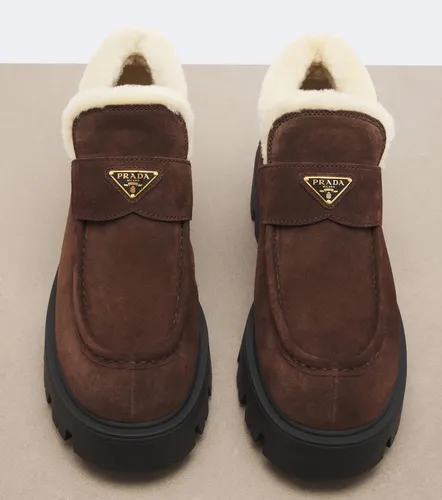 Shearling-lined suede ankle boots - Prada - Modalova