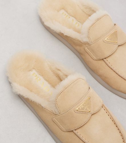 Prada Shearling-lined suede mules - Prada - Modalova