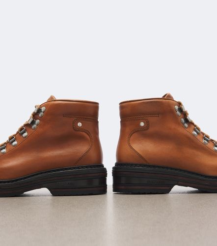 Miu Miu Botas con cordones de piel - Miu Miu - Modalova