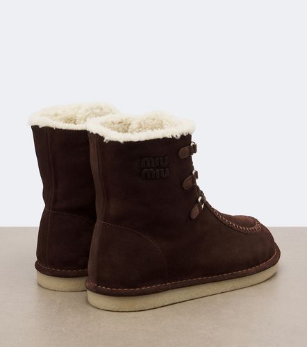 Schnürstiefel aus Veloursleder mit Shearling - Miu Miu - Modalova