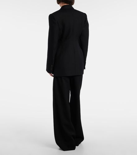Pleated low-rise wide-leg wool pants - Wardrobe.NYC - Modalova