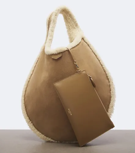 One Piece shearling-lined suede shoulder bag - Alaia - Modalova
