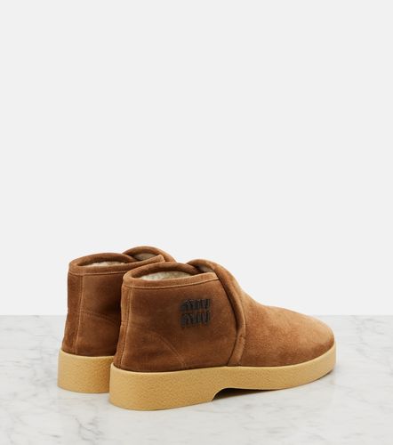 Miu Miu Shearling-lined suede boots - Miu Miu - Modalova