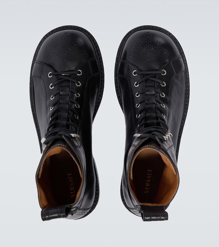 Billy perforated leather combat boots - Versace - Modalova