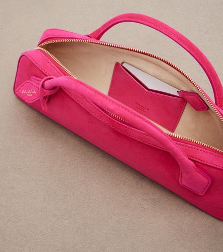 Alaia Le Teckel Small suede clutch - Alaia - Modalova