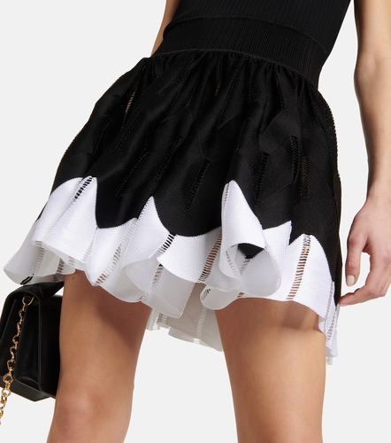 Alaia V-neck minidress - Alaia - Modalova