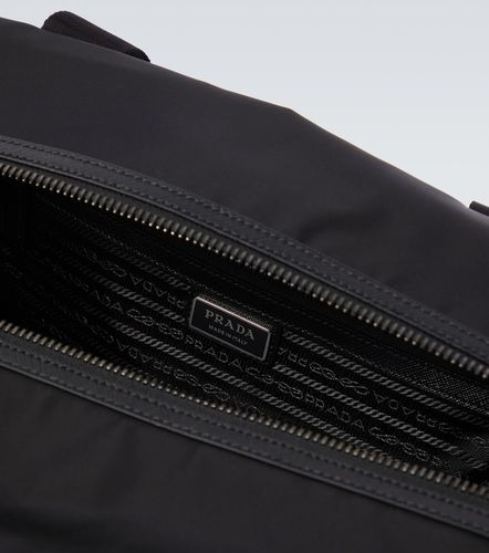 Re-Nylon leather-trimmed duffel bag - Prada - Modalova