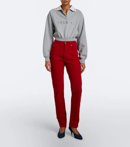 Pantaloni slim in velluto di cotone a coste - Versace - Modalova