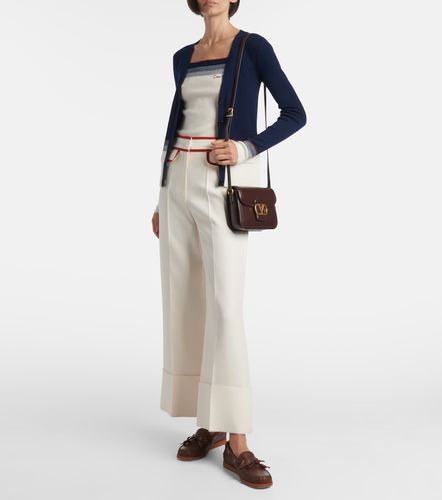 Striped virgin wool cardigan - Valentino Garavani - Modalova