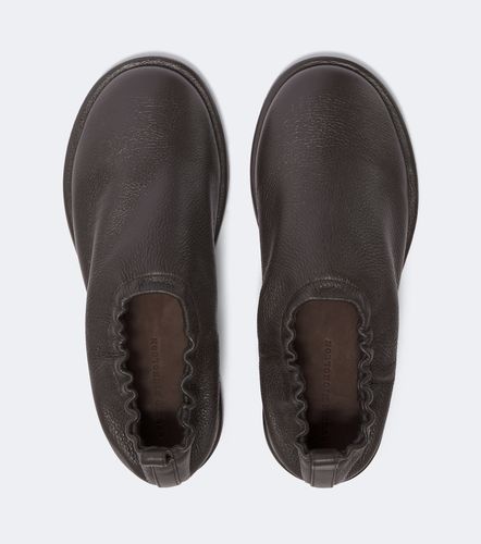 Korine leather slip-on shoes - Studio Nicholson - Modalova