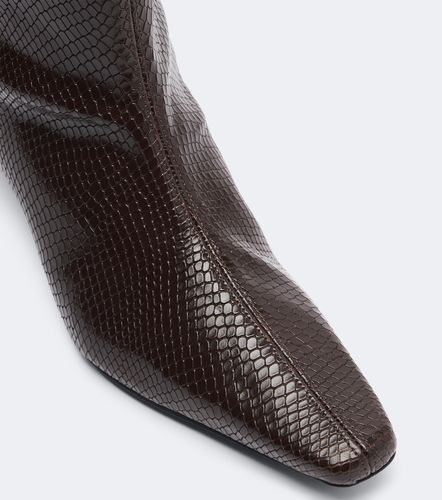 Wally snake-print leather knee-high boots - Staud - Modalova