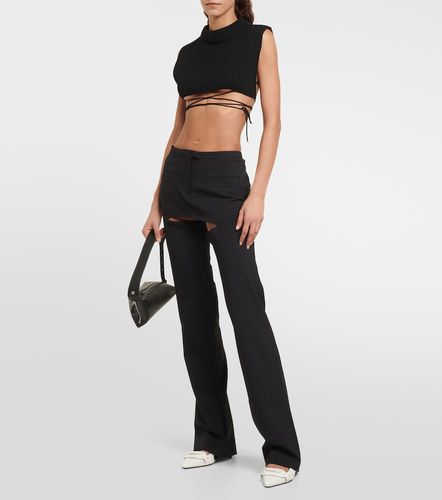 Cutout wool-blend flared pants - Courreges - Modalova