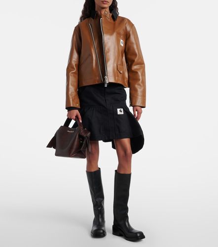 X Carhartt asymmetric leather jacket - Sacai - Modalova