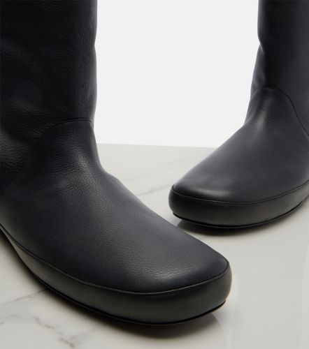 Toni shearling-lined leather ankle boots - The Row - Modalova