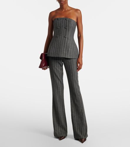 Top a rayas con peplum - Carolina Herrera - Modalova