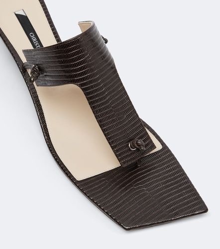 Edge snake-effect leather mules - Christen - Modalova