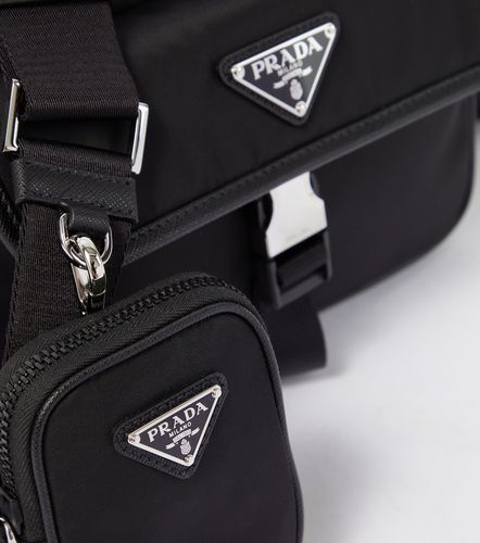 Re-Nylon leather-trimmed shoulder bag - Prada - Modalova