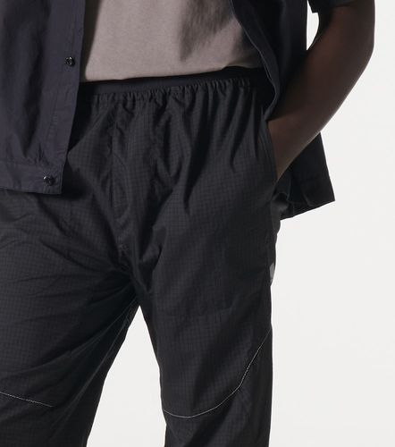 Pantalones rectos de nylon ripstop - And Wander - Modalova