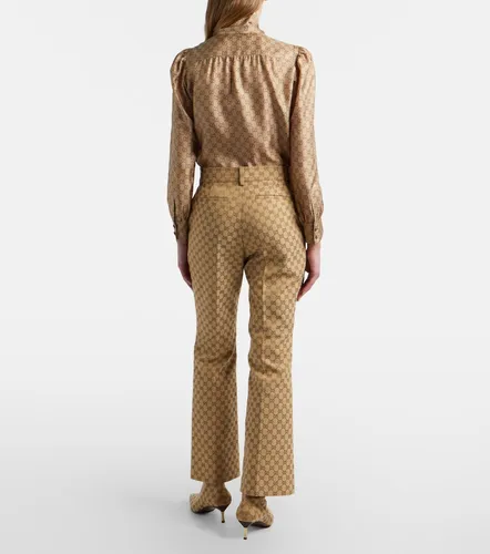 Gucci Pantalones flared de lona GG - Gucci - Modalova