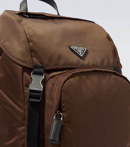 Re-Nylon leather-trimmed backpack - Prada - Modalova