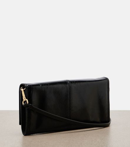 Bustina in pelle con logo e tracolla - Prada - Modalova