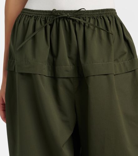 Alaia Peplum cotton tapered pants - Alaia - Modalova