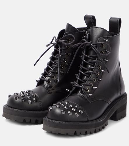 Stivali biker in pelle con borchie - Junya Watanabe - Modalova