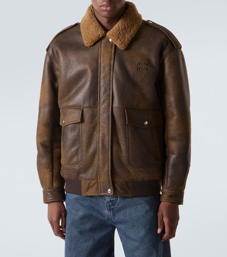 Giacca blouson in pelle con shearling - Miu Miu - Modalova