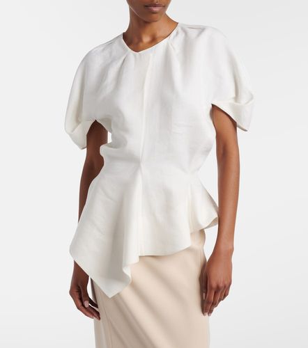 Khaite Rumi peplum linen-blend top - Khaite - Modalova