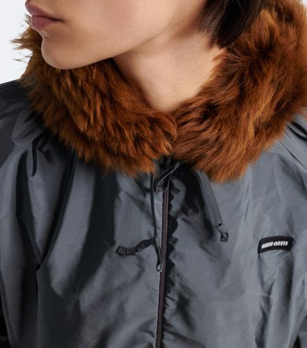 Shearling-trimmed technical jacket - Miu Miu - Modalova