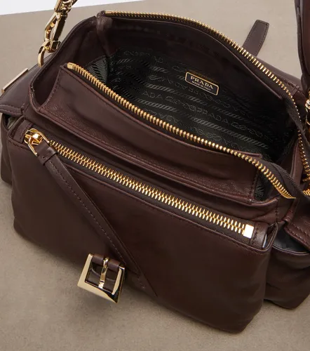 Explore Medium leather shoulder bag - Prada - Modalova
