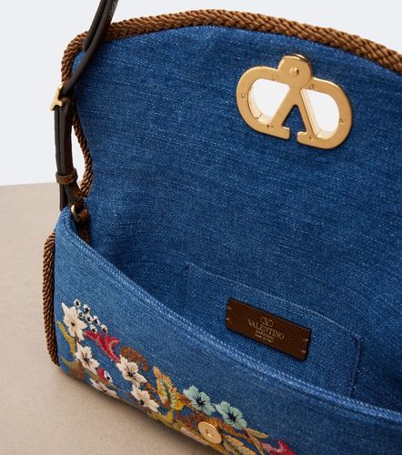 DeVain Small embroidered denim shoulder bag - Valentino Garavani - Modalova
