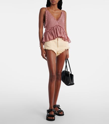 Shorts de denim con flecos - The Attico - Modalova